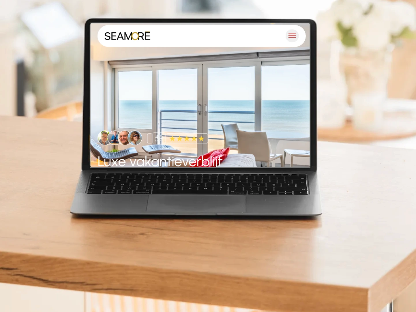 Website Seamore appartement-met-zeezicht.be op het scherm van een laptop